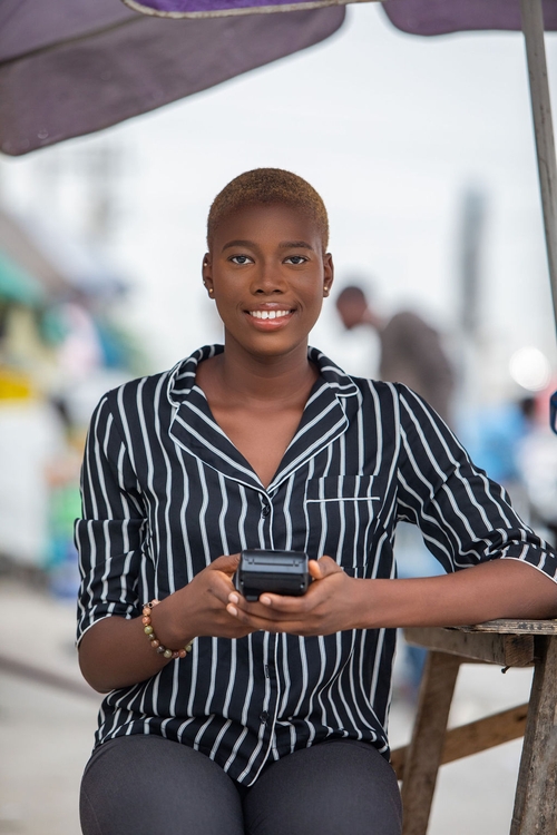 Smiling lady with POS